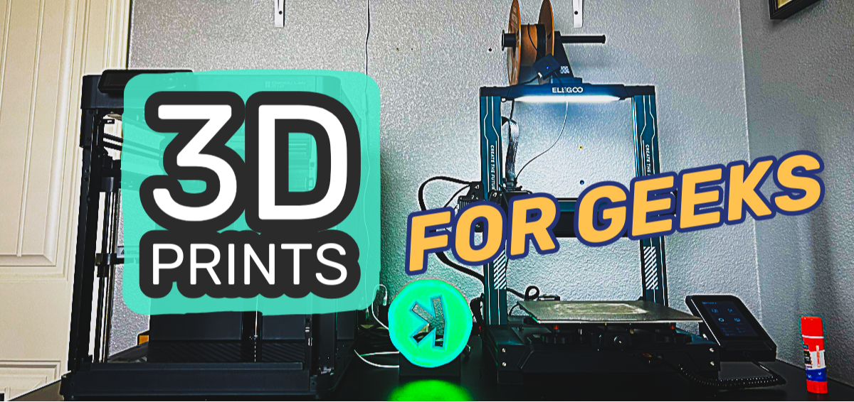 3D printer with '3D Prints for Geeks' text in a workshop setting